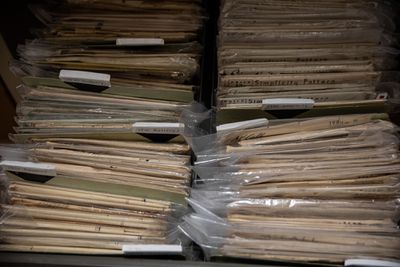 Director of Distinctive Collections, Karen Morse gives a tour of the Consumer Pattern Archive housed in Carothers Library at the University of Rhode Island. The largest of it's kind in the world, it contains over 60,000 patterns dating from 1847. Kingston, Rhode Island on April 21st 2022.
